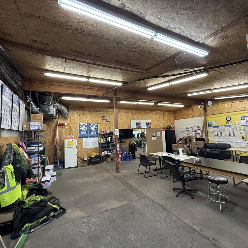 Commercial shop space with overhead strip lighting